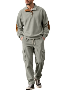 Detail of sage green corduroy sweatshirt with button collar and work pants set for men