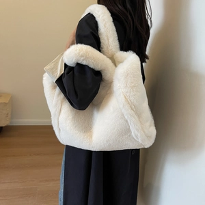 Chic white plush tote bag for women featuring a spacious soft faux fur shoulder design