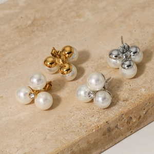 Elegant gold and silver flower stud earrings with three pearls and central crystal