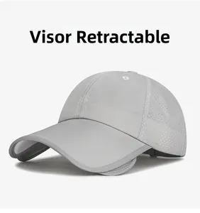 Detail of light grey sun hat featuring breathable laser-cut holes and retracted side visor