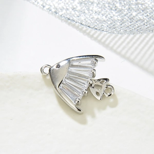 Silver fish pendant connector with sparkling baguette cubic zirconia and hollow tail design