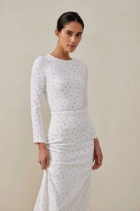Detail of vintage floral print and premium fabric on a slim-fit long-sleeve maxi dress