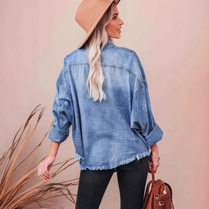 Women's vintage washed denim shirt with drop shoulders and frayed hem back view