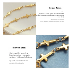 Detailed close-up of 18K gold-plated surgical steel cross link chain bracelet
