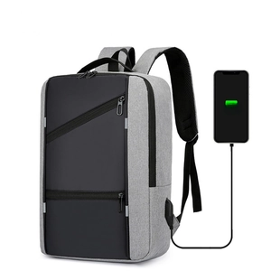 Business laptop backpack with USB charging port and multi-compartment design in grey