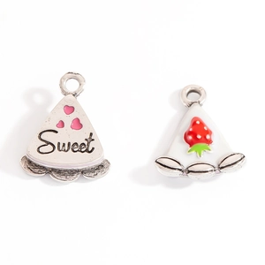 Detail of sweet cake and strawberry enamel alloy pendants with silver metal rings