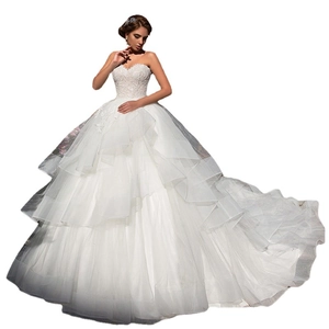 Elegant off-shoulder white wedding dress with lace embroidery and long train skirt
