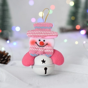 Pink Christmas snowman bell ornament with knit hat and star cutouts on white base