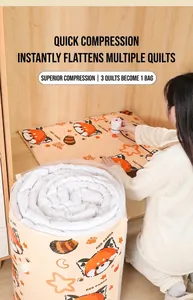 Large vacuum storage bag compressing a thick quilt with a cute red panda pattern