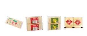 Detail view of various bamboo toothpick packaging designs for hotels and home use