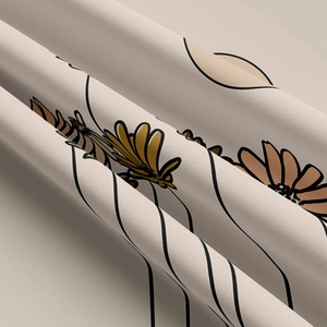 Detailed close-up of bohemian floral print fabric with modern hand-drawn pattern