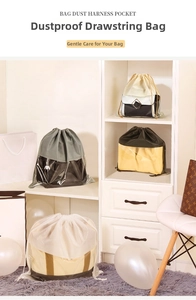 Detail of drawstring dust bag with transparent PVC window for handbag organization