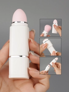 Detail view of 8-in-1 multifunctional makeup tool with sponge head and soft pink bristles