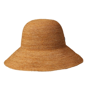 Handwoven raffia sun hat for women with large brim in warm amber natural fiber