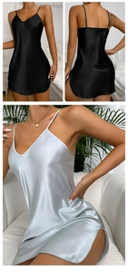 Detail of satin slip dress featuring V-neckline and high-gloss silk texture for women