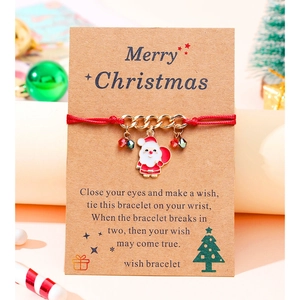 Red braided Christmas wish bracelet with Santa Claus enamel charm on gift card