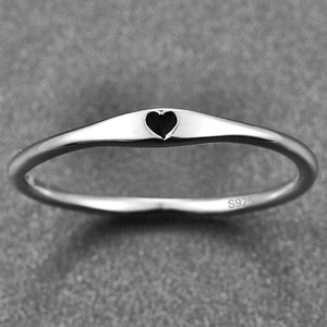 S925 sterling silver ring featuring a minimalist black enamel heart cutout design