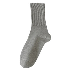Grey cotton crew socks with ribbed texture for men in a minimalist casual sport style