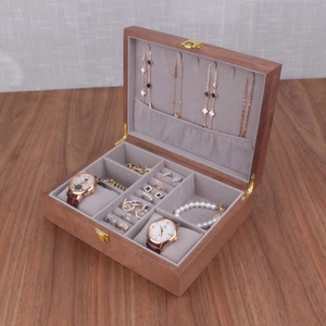 Dark brown wood jewelry box with gray velvet interior for watches and rings