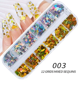 Close-up of 12-grid heart-shaped nail art sequins set with holographic laser finish