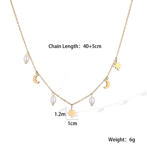Detail of 18K gold plated necklace featuring celestial star moon charms and white pearls