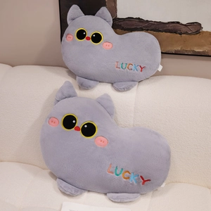 Cute gray cat bean-shaped plush pillow with Lucky embroidery on soft white sofa