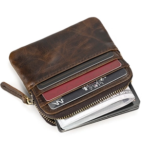 Detailed macro view of vintage brown crazy horse leather coin purse with L-zip and card slots