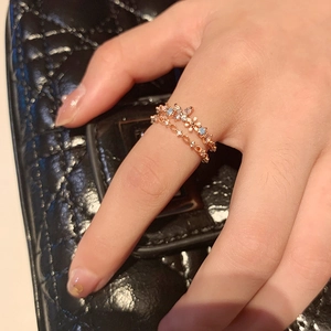 Rose gold butterfly and flower stacking ring set with light blue zircon accents