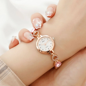 Luxurious rose gold quartz watch for women with heart-shaped rhinestone and pink gem bracelet