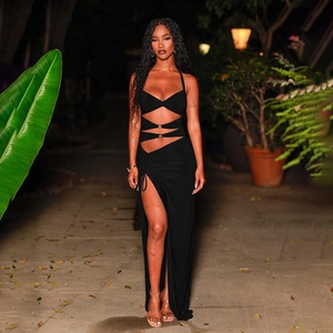 Black cutout halter neck dress with metal buckle detail and sexy high leg slit style