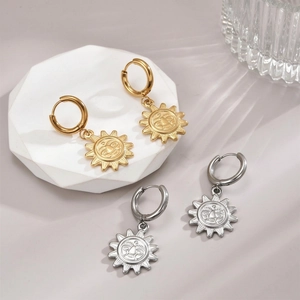 Minimalist stainless steel sun pendant hoop earrings in gold and silver finishes