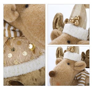 Detail of plush reindeer Christmas ornament with gold sequins and striped scarf