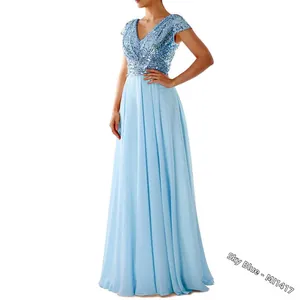 Close-up of sky blue sequin V-neck bodice with flowing chiffon evening gown skirt
