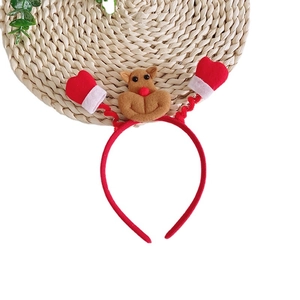 Festive red Christmas headband featuring cute plush reindeer and mini glove decorations