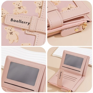 Pink leather wallet with cute bear print and zipper, featuring multiple card slots
