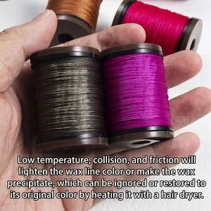 0.4mm round waxed thread for hand sewing on spools in dark grey and bright purple