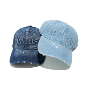 Distressed washed denim baseball caps with PARIS embroidery in blue and light blue