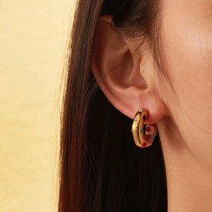U-shaped gold stainless steel earrings featuring vibrant multi-color zircon stone inlays
