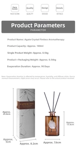 Macro shot of 180ml amber glass diffuser bottle with agate slice and reed sticks in gift box