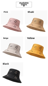Collection of embroidered cotton bucket hats in pink, beige, khaki, yellow, and black colors