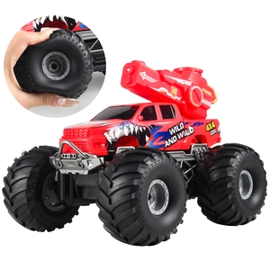 Red 4WD remote control monster truck with giant rubber tires for all-terrain off-road racing