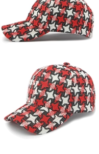 Close-up of the thick red and black houndstooth pattern fabric on this baseball cap