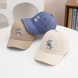 Detail view of quick-dry kids baseball caps with dinosaur embroidery and air vents