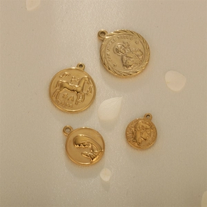 Gold stainless steel religious pendant set with San Judas Tadeo engravings on fabric