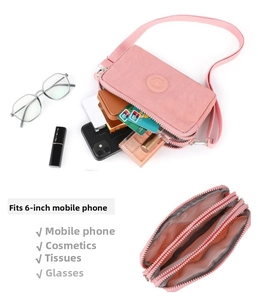 Borsa a tracolla in nylon rosa con tre tasche con cerniera e spazio compatto