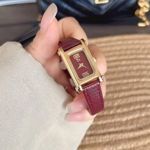 Luxury square gold women's watch with burgundy leather strap and matching red dial