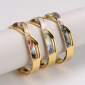 Three-piece stainless steel crossover bangles with colorful enamel floral patterns