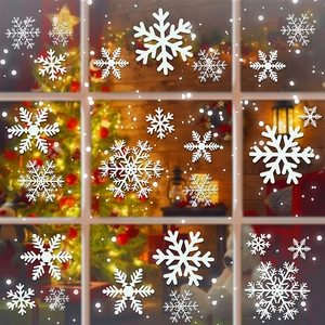 Gros plan de stickers électrostatiques flocons blancs pour décoration vitre Noël