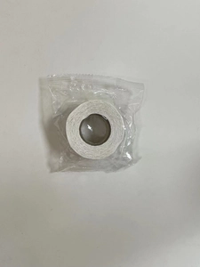 Close-up of laser rainbow thank you stickers in a transparent self-sealing plastic bag