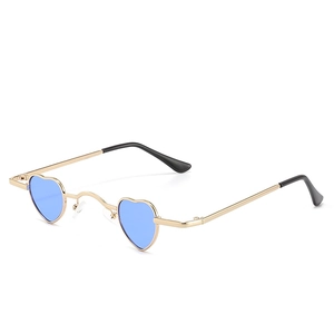 Vintage heart shaped small frame sunglasses with gold metal frame and blue lenses